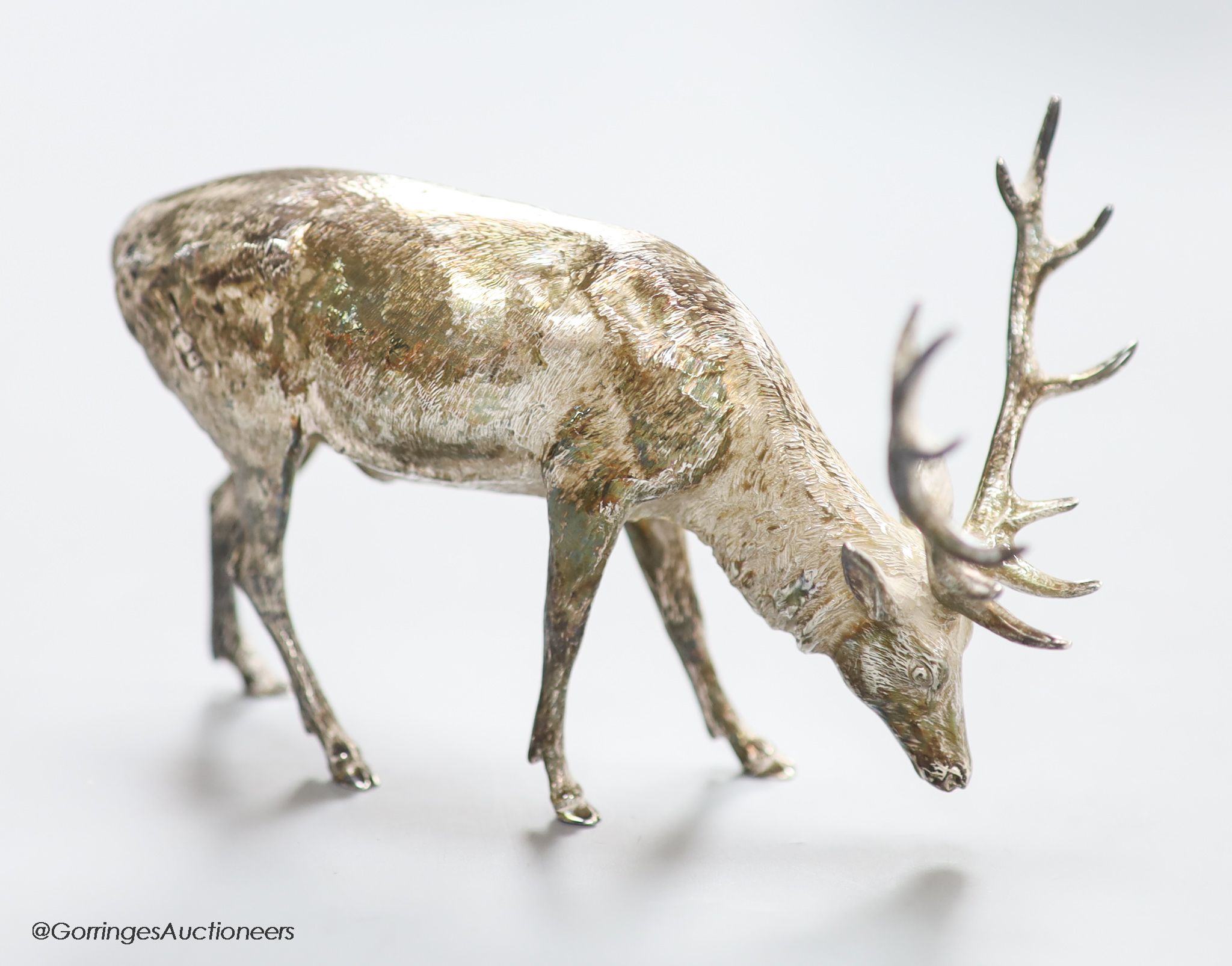 A modern free standing silver miniature model of a stag, C.F.H & Co, London, 1993, height 75mm, 195 grams.